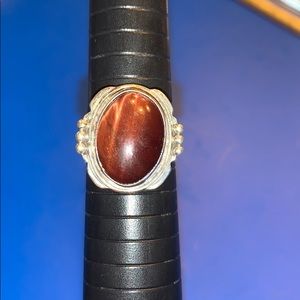 Sterling silver ring with tiger eye stone.